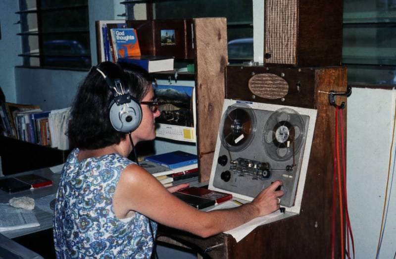 A young woman operating a recording device in the Feba Seychelles station in the 1960's.