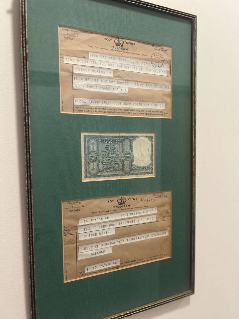 A five rupee note, given to Feba by one of their first listeners in India to support the ministry, framed and hanging on the wall in the UK office.