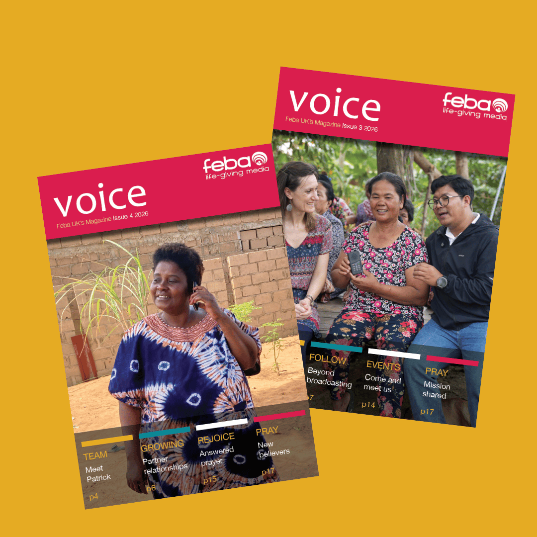 Two issues of voice magazine on a yellow background.